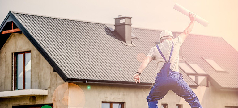 A man being happy about his roof