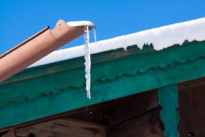 Try to thaw ice in gutters instead of breaking it