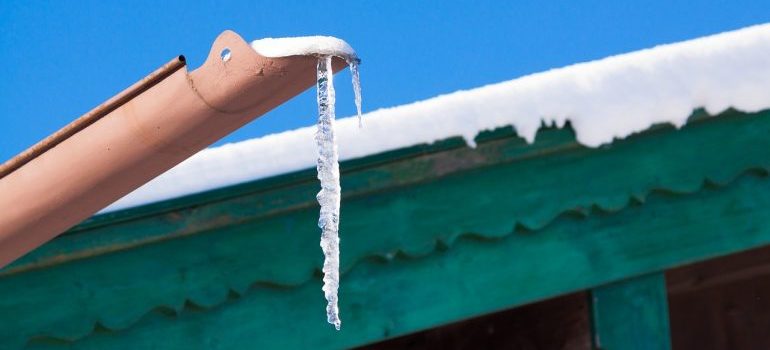 Minimize the effect of snow and ice on your gutters.