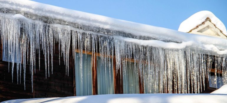 Snow and ice impact gutters negatively