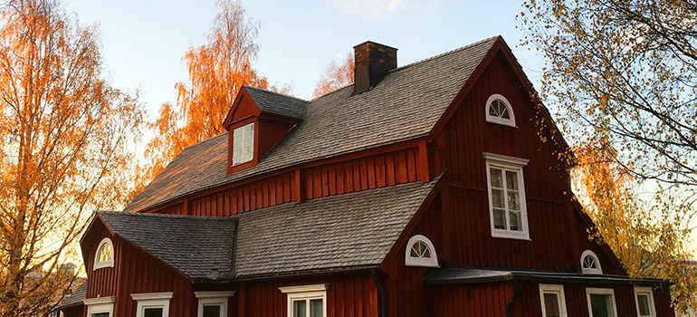 A red house on a mild day.