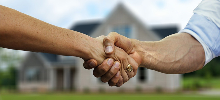 Two people shaking hands