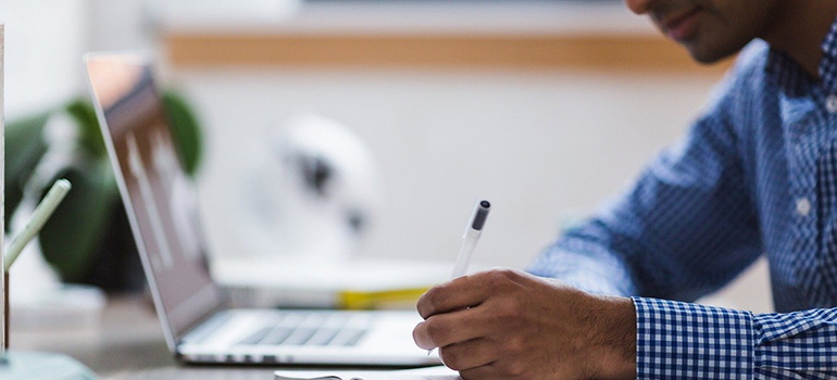 A man doing research on the Internet